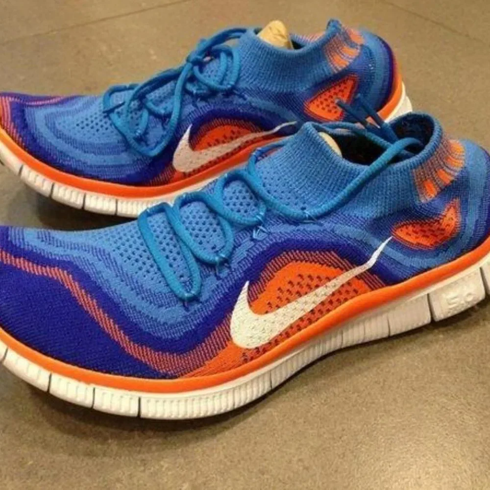 New in Box Nike Flyknit + Blue Glow Total Orange Mens 9.5 US 43 EUR RARE